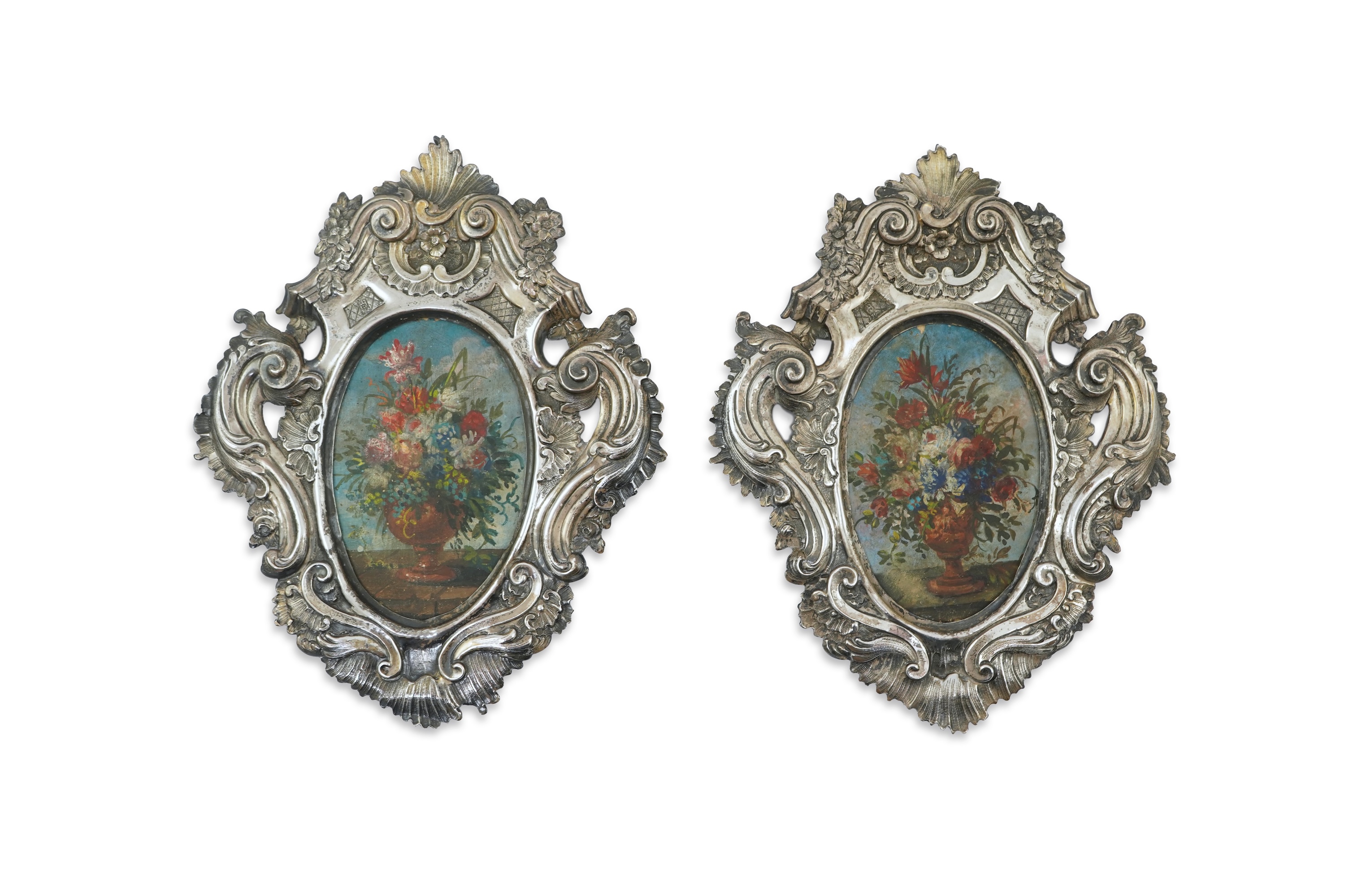 A pair of 18th century Italian Rococo repousse silver frames